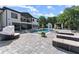 Luxurious backyard with a pool, spa, gazebo, and stylish seating at 1336 Azalea Dr, Lawrenceville, GA 30043