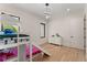 Charming bedroom featuring bunk beds with a slide, complemented by hardwood floors and natural light at 1336 Azalea Dr, Lawrenceville, GA 30043
