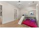 Bedroom features a stylish bunk bed with a slide, modern lighting, and hardwood floors at 1336 Azalea Dr, Lawrenceville, GA 30043