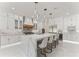Beautiful kitchen featuring marble countertops, a large island with seating, and stainless steel appliances at 1336 Azalea Dr, Lawrenceville, GA 30043