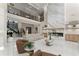 Bright and airy living room with soaring ceilings, fireplace, and modern furnishings at 1336 Azalea Dr, Lawrenceville, GA 30043