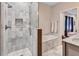 Elegant bathroom with marble shower, soaking tub, and modern fixtures at 2418 Bolling Brook Sw Dr, Atlanta, GA 30311