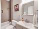 Well-lit bathroom featuring a shower-tub combo and a sleek vanity at 2418 Bolling Brook Sw Dr, Atlanta, GA 30311