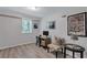 Bright bedroom with a functional desk space, ideal for a home office or study area with natural light and comfortable seating at 2418 Bolling Brook Sw Dr, Atlanta, GA 30311