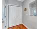 Entryway with a closet for storage, mirror and light gray walls at 2418 Bolling Brook Sw Dr, Atlanta, GA 30311