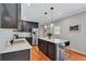 Well-appointed kitchen with stainless steel appliances, a spacious island with seating, and ample counter space at 2418 Bolling Brook Sw Dr, Atlanta, GA 30311