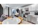 Open-concept kitchen with modern appliances, flowing into the living area for easy entertaining and comfortable living at 2418 Bolling Brook Sw Dr, Atlanta, GA 30311