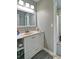 Clean bathroom featuring a shower, window and a spacious single vanity at 2420 Westport Cir, Marietta, GA 30064