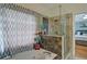 Bathroom featuring a luxurious jacuzzi tub and a walk-in shower with marble tile at 2420 Westport Cir, Marietta, GA 30064
