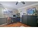 Cozy bedroom with hardwood floors, ceiling fan, and ample space for furniture and relaxation at 2420 Westport Cir, Marietta, GA 30064