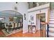 Elegant dining room with hardwood floors, decorative lighting, and large table with seating for ten at 2420 Westport Cir, Marietta, GA 30064