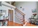 Welcoming foyer boasts a staircase, hardwood floors, and elegant decor for a grand entrance at 2420 Westport Cir, Marietta, GA 30064
