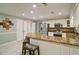 Spacious kitchen with granite countertop island and stainless steel appliances at 2420 Westport Cir, Marietta, GA 30064