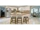 Open kitchen featuring granite counters, stainless appliances, and seating at the peninsula at 2420 Westport Cir, Marietta, GA 30064