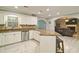Bright kitchen with white cabinetry, granite countertops, and stainless steel appliances at 2420 Westport Cir, Marietta, GA 30064