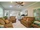 Spacious living room with fitness equipment and views into the dining area at 2420 Westport Cir, Marietta, GA 30064