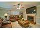 Comfortable living room with fireplace and large-screen television at 2420 Westport Cir, Marietta, GA 30064