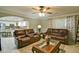 Open living room with decorative rug and cozy seating near the kitchen at 2420 Westport Cir, Marietta, GA 30064
