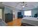 Spacious main bedroom with vaulted ceiling, hardwood floors, and an ensuite bathroom at 2420 Westport Cir, Marietta, GA 30064