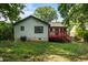 Exterior home view with a red deck and grassy backyard at 429 Deckner Sw Ave, Atlanta, GA 30310