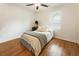 Bright bedroom with hardwood floors, ceiling fan, and a window with blinds at 429 Deckner Sw Ave, Atlanta, GA 30310