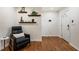 Inviting foyer featuring hardwood floors, and a sleek black leather lounge chair at 429 Deckner Sw Ave, Atlanta, GA 30310