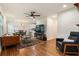 Open-concept living room with hardwood floors and modern furnishings at 429 Deckner Sw Ave, Atlanta, GA 30310