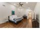 Spacious main bedroom features vaulted ceiling, fan, and hardwood flooring at 429 Deckner Sw Ave, Atlanta, GA 30310