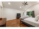 Bright, spacious main bedroom featuring vaulted ceiling, fan, and hardwood flooring at 429 Deckner Sw Ave, Atlanta, GA 30310