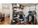 Organized walk-in closet with shelving, hanging racks, and a view to another room at 429 Deckner Sw Ave, Atlanta, GA 30310