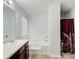 Bright bathroom featuring a soaking tub, large vanity and modern finishes at 468 Berkshire Place, Fairburn, GA 30213