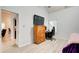 Bedroom with wood floors, a large dresser and a dedicated office space at 468 Berkshire Place, Fairburn, GA 30213