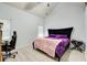 Spacious main bedroom featuring wood floors, vaulted ceilings, and a king-size bed at 468 Berkshire Place, Fairburn, GA 30213