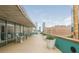 Spacious balcony perfect for relaxing and enjoying scenic city views and outdoor seating at 845 Spring Street Northwest Nw St # 307, Atlanta, GA 30308