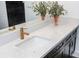 Modern bathroom vanity featuring marble countertop, bronze fixtures, and minimalist design at 845 Spring Street Northwest Nw St # 307, Atlanta, GA 30308