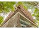 Contemporary brick building with modern architecture, enhanced by lush surrounding trees at 845 Spring Street Northwest Nw St # 307, Atlanta, GA 30308