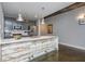 Modern kitchen with granite countertops, stainless steel appliances, and concrete floors at 845 Spring Street Northwest Nw St # 307, Atlanta, GA 30308