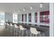 Kitchen bar with modern counter and seating with stylish pendants at 845 Spring Street Northwest Nw St # 307, Atlanta, GA 30308