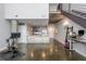 Open-concept living space with kitchen, dining, and living area featuring modern fixtures at 845 Spring Street Northwest Nw St # 307, Atlanta, GA 30308