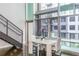 Contemporary living space featuring large windows, modern staircase, and sleek decor at 845 Spring Street Northwest Nw St # 307, Atlanta, GA 30308