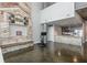 Bright open space with a custom wood accent wall and concrete structural beams at 845 Spring Street Northwest Nw St # 307, Atlanta, GA 30308