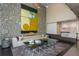 Welcoming lobby featuring stone wall, artwork, modern furniture, and a stylish reception area at 845 Spring Street Northwest Nw St # 307, Atlanta, GA 30308