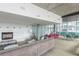 Bright lounge with fireplace, modern furniture, and large windows with city views at 845 Spring Street Northwest Nw St # 307, Atlanta, GA 30308
