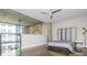 Bright bedroom space with loft, exposed concrete, and floor to ceiling window at 845 Spring Street Northwest Nw St # 307, Atlanta, GA 30308