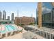Relaxing rooftop pool and lounge area with city views and comfortable seating at 845 Spring Street Northwest Nw St # 307, Atlanta, GA 30308