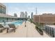 Elevated rooftop pool and lounge area with stunning cityscape views at 845 Spring Street Northwest Nw St # 307, Atlanta, GA 30308