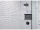 Shower featuring white subway tile, modern fixtures, niche, and glass surround at 845 Spring Street Northwest Nw St # 307, Atlanta, GA 30308