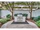 Outdoor stainless steel gas grill on a stone patio, perfect for outdoor cooking and entertaining at 195 14Th St # 902, Atlanta, GA 30309