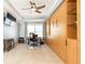 Comfortable bedroom featuring a built in cabinet and shelving system and ceiling fan at 211 Colonial Homes Nw Dr # 2501, Atlanta, GA 30309
