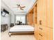 Bedroom with a built-in cabinet and shelves, offering ample storage, with a murphy bed at 211 Colonial Homes Nw Dr # 2501, Atlanta, GA 30309